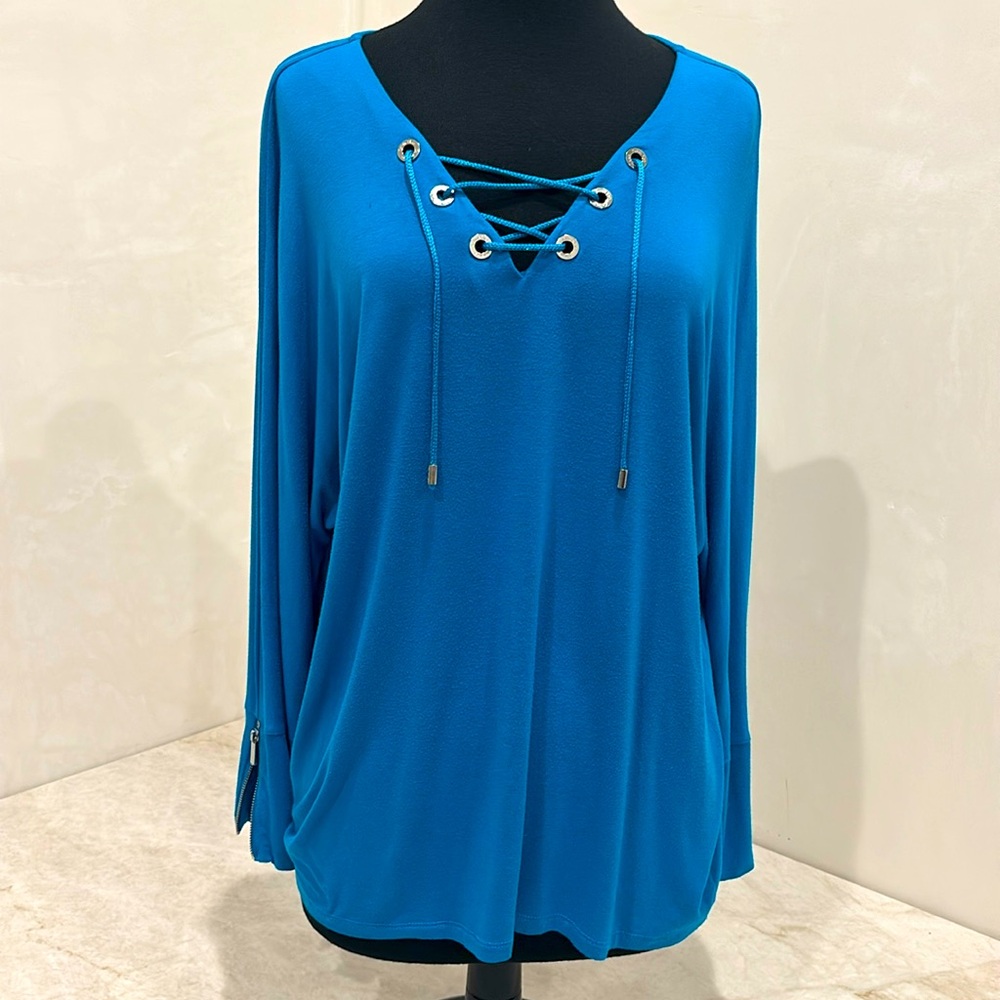 Calvin Klein Women's stunning Blue-turquoise shade Lace up Long Sleeve Top.